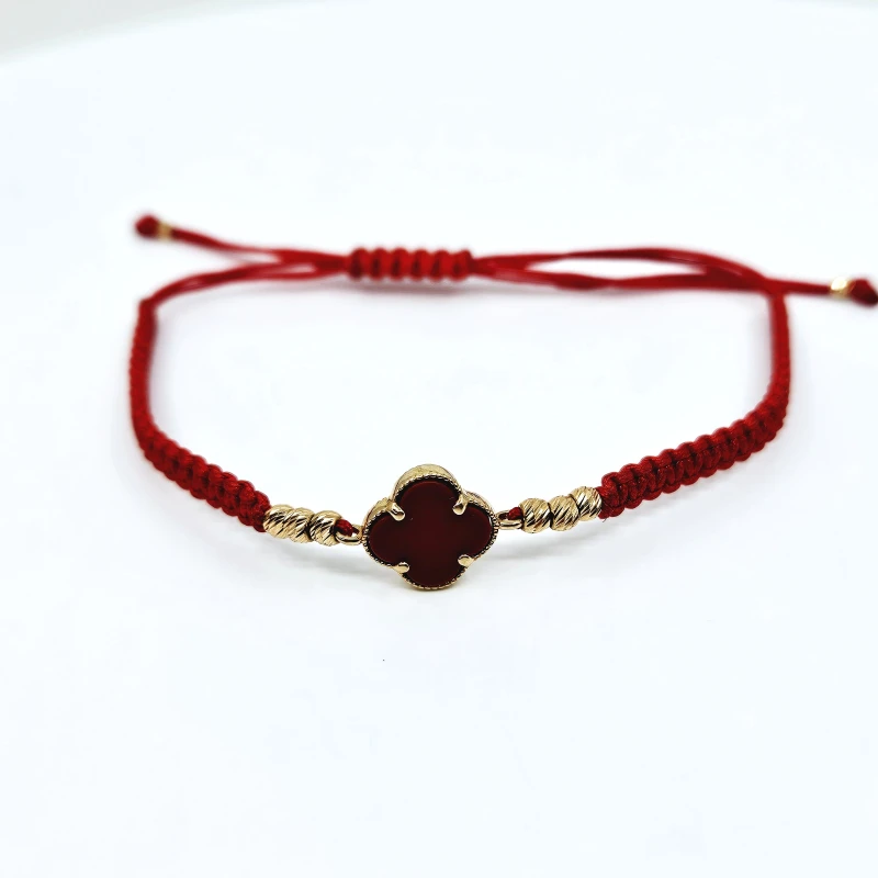 Raudono siūlo apyrankė su auksu ir koralo akmeniu AP0072